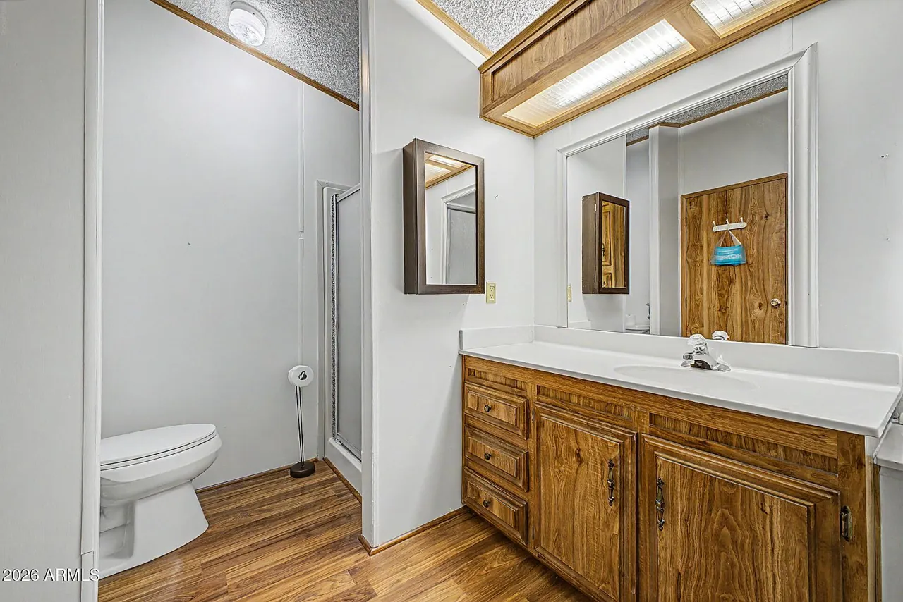 Hallway with wainscoting and wood trim