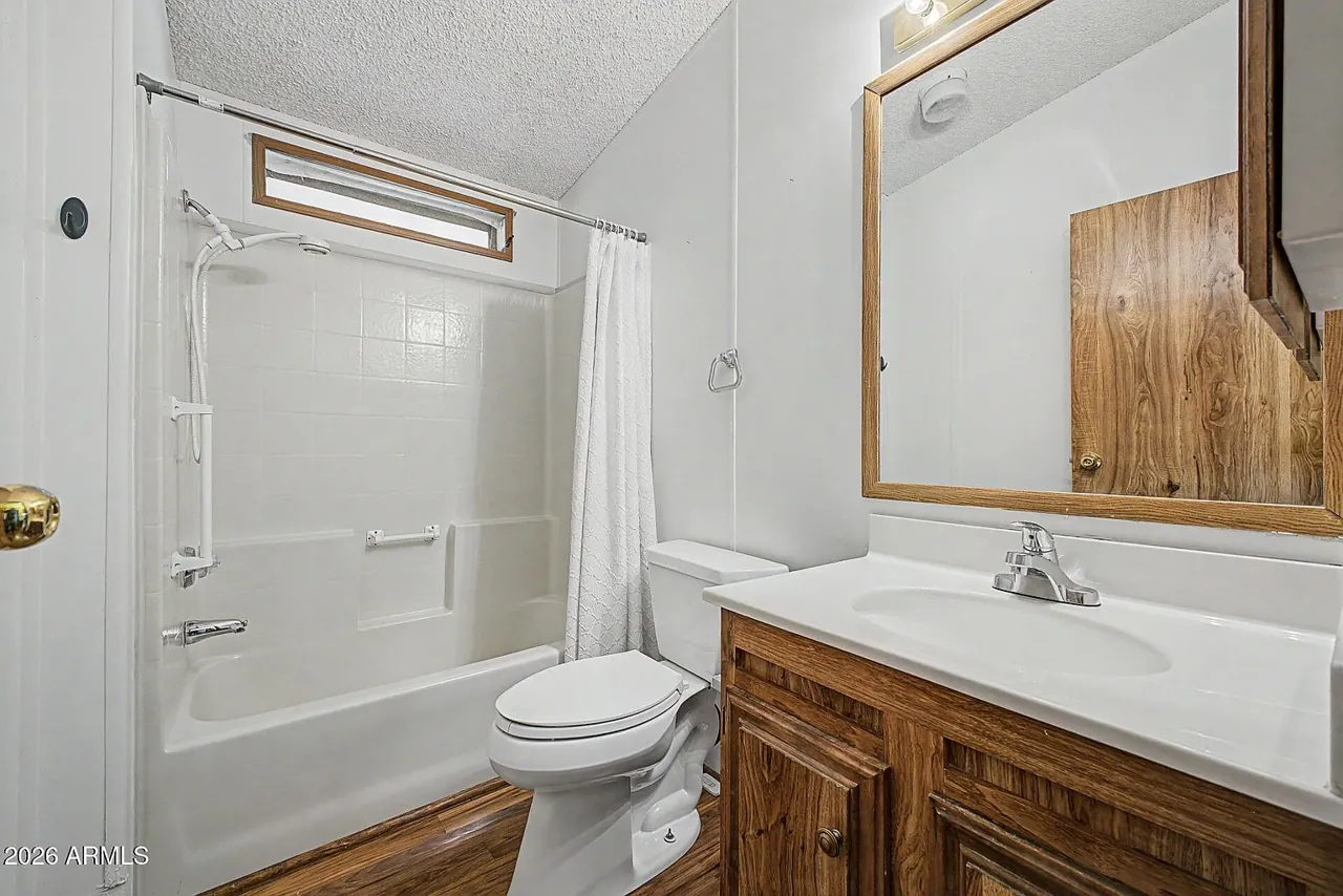 Bathroom with tub-shower combination